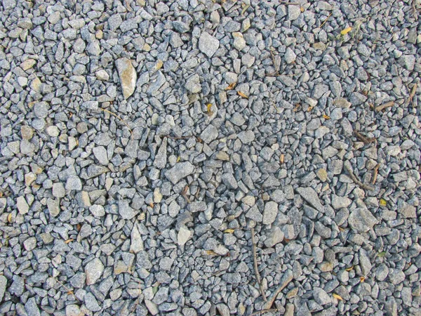 gray gravel lies on the ground