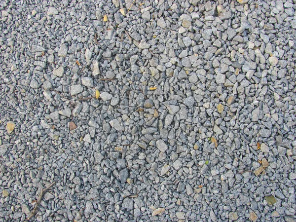 gray gravel lies on the ground