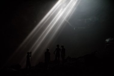 Beams of Light and Dark Cave clipart