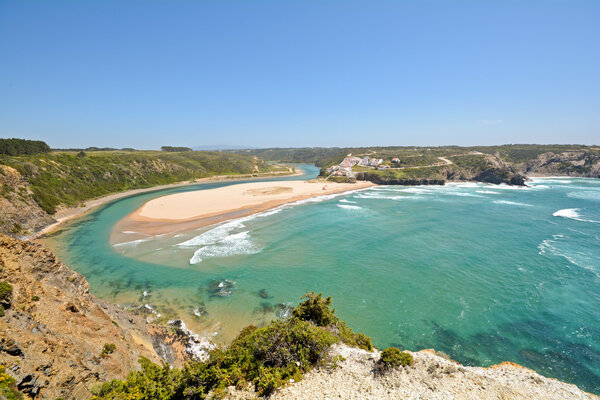 Algarve: Panoramic view to Praia de Odeceixe, Surfer beach and little village near Aljezur, Portugal