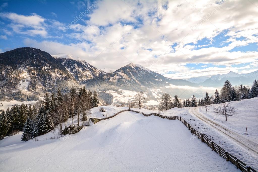 View to a winter landscape with mountain range and Gasteinertal valley near Bad Gastein, Pongau Alps - Salzburg Austria Europe