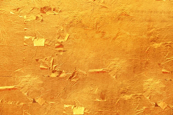 Zlatý papír textura pro pozadí. — Stock fotografie