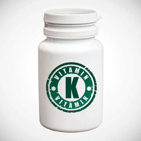 Frasco de pastillas con vitamina K — Foto de Stock