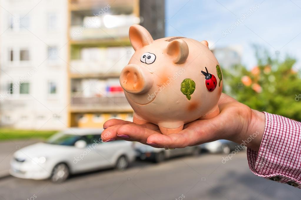 All savings money from pink ceramic piggy bank to pay for the dr