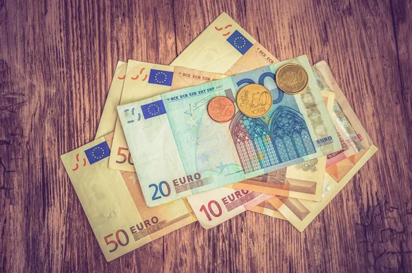 Euro banknotes and euro coins — Stock Photo, Image