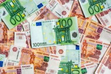 Russian and Euro banknotes background