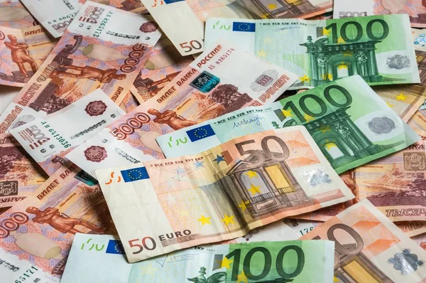 Notas russas e euro fundo — Fotografia de Stock