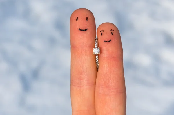 Enamored fingers with engagement ring — Stock Photo, Image