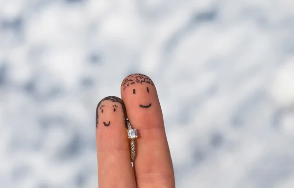 Enamored fingers with engagement ring — Stock Photo, Image