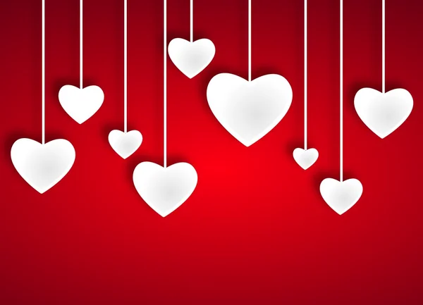 Vackra vita hjärtan på rött papper — Stockfoto
