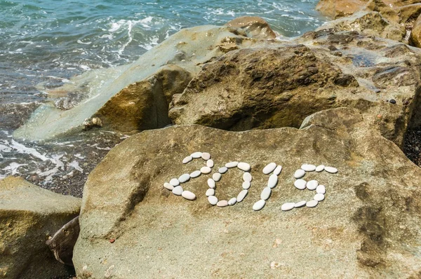 Numer 2015 na skałach u wybrzeży — Zdjęcie stockowe