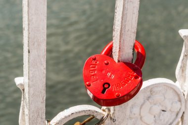 Love padlock or love lock on a railing clipart
