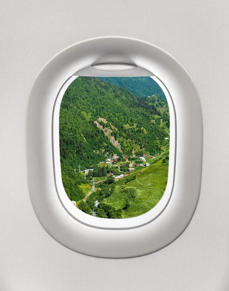 조지아에서 마에 비행기의 창 밖을 보면서 — 스톡 사진