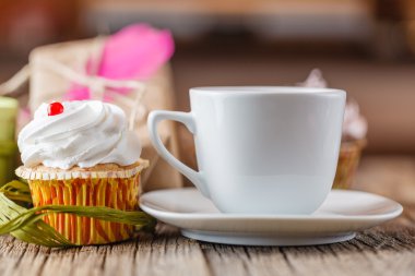 coffee break with gift box and colorful marshmallow