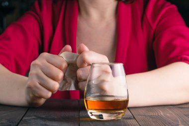 woman crush paper note and drink