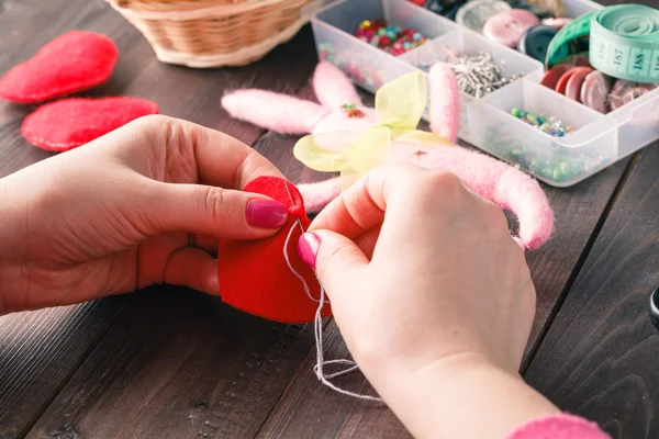 Sewing Process - Women's hands behind her sewing, toy made — Stockfoto