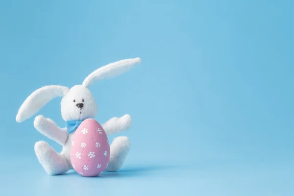Happy Easter - Toy rabbit and easter eggs
