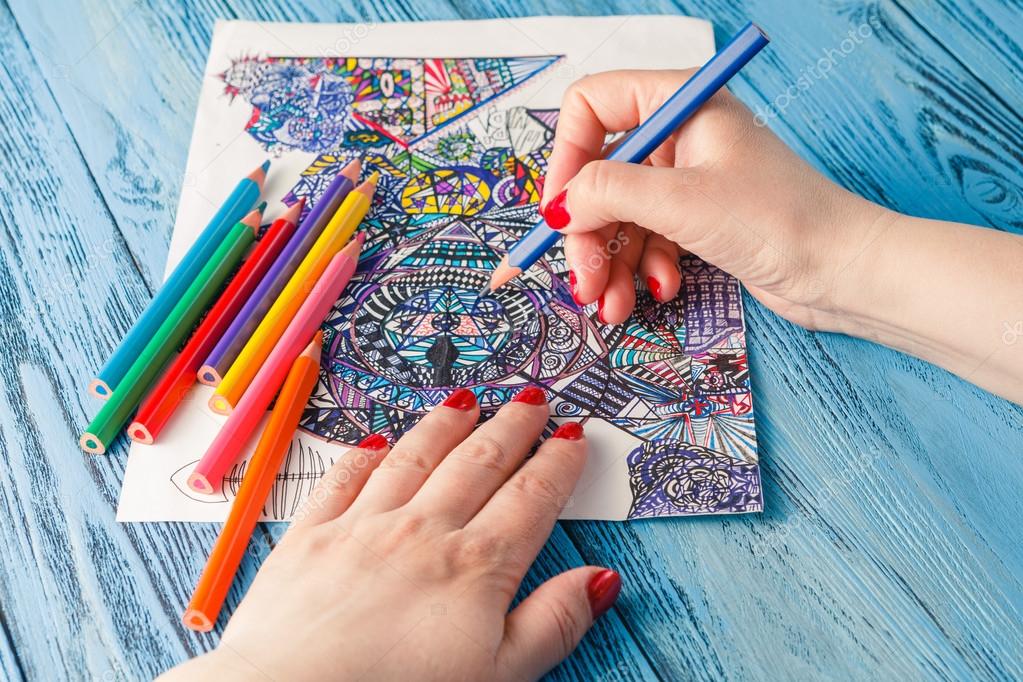 Adult coloring books colored pencils anti-stress tendency. Hobbi Stock  Photo by ©AndreyCherkasov 109168838