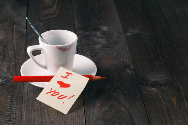 Cup of coffee with trace of lipstick