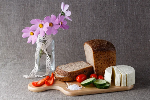 Sliced bread on wood — Stock Photo, Image