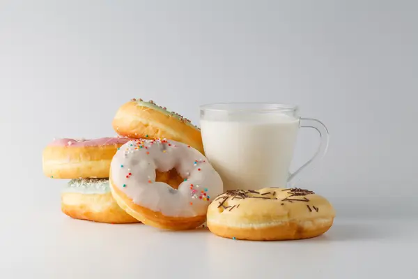 Colored donuts on white plain background — Stock Photo, Image