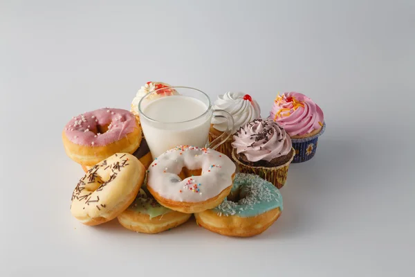 Colored donuts on white plain background — Stock Photo, Image