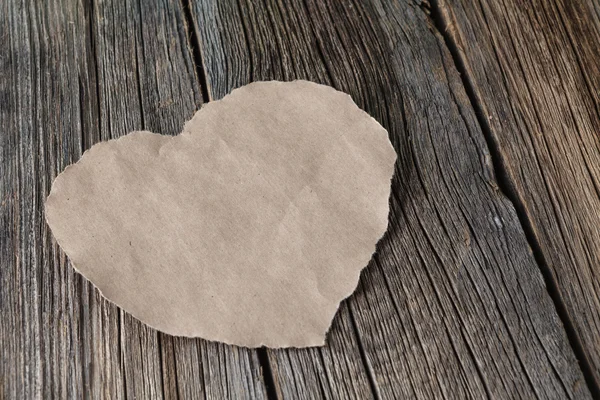 Heart on rustic wooden table — Stock Photo, Image