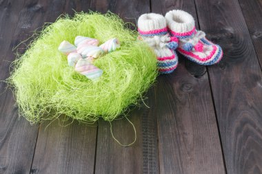 Hatmi ve bebek bootie bükülmüş