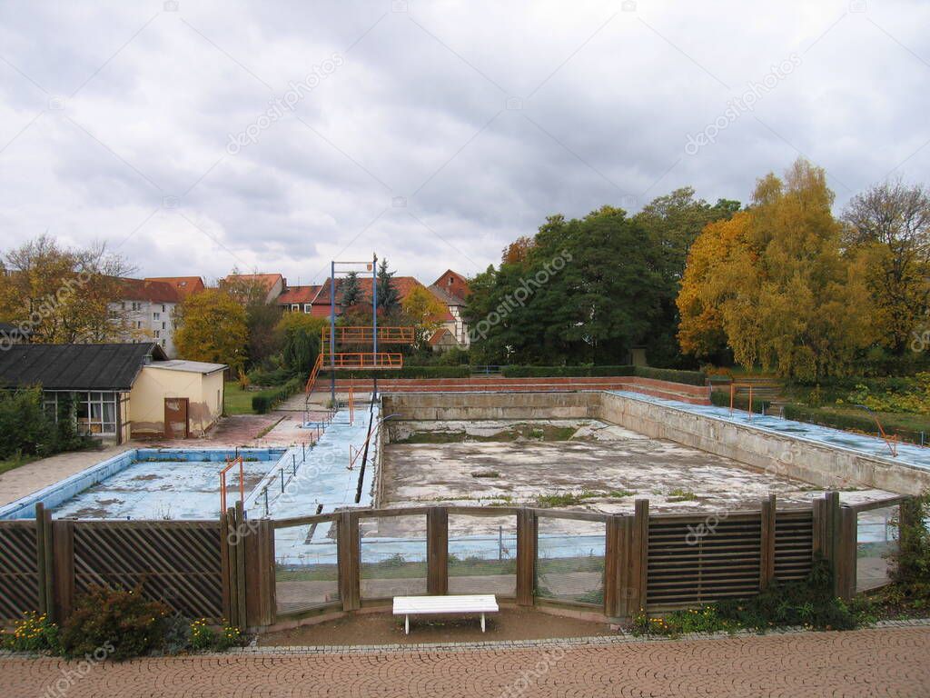 An old abandoned swimming pool.