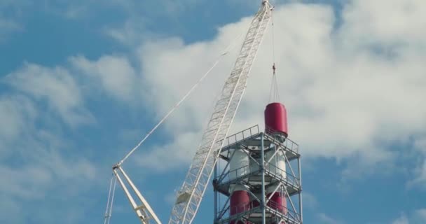 Chimney pipe construction, the crane lifts the pipe segment. Timelapse — Stock Video