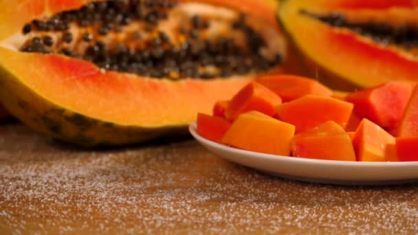 Salt Being Sprinkled Top Orange Slices Papaya Kept Ceramic Plate — Stock Video