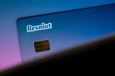 Revolut bank card. Revolut is global financial technology company offering modern banking services with low fees. Offers bank accounts, debit cards, fee-free currency exchange, stock trading, cryptocurrency exchange and peer-to-peer payment