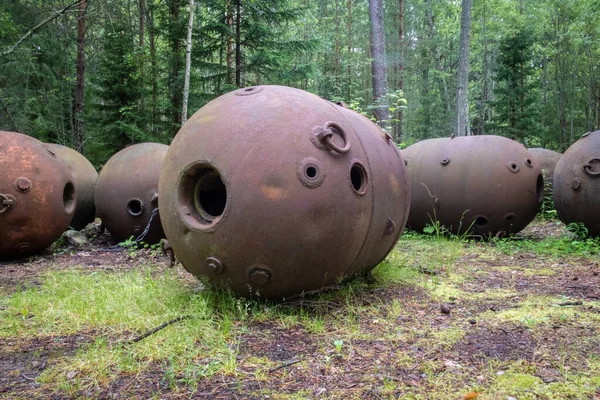 Old soviet underwater naval mines casings scattered in the forest of Naissaar island, Estonia. Sea mines left behind by the Soviet army