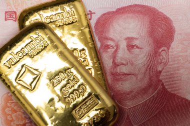 Altın külçeleri ve Çin Yuan Renminbi banknotları, kağıt para ve para birimi. Çin Bankası rezervleri. Altın destekli Çin yuanı. Çin 'in mali sistemi.