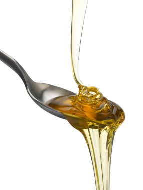 Bir kaşık üzerinde altın Şeker Pekmezi