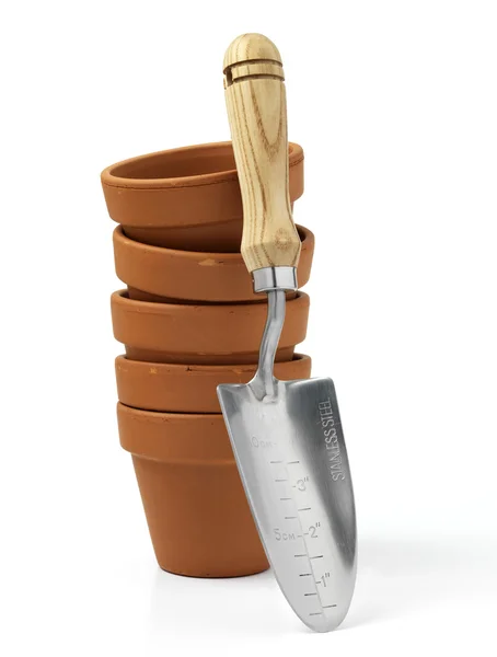 Terracotta pot and trowel — Stock Photo, Image