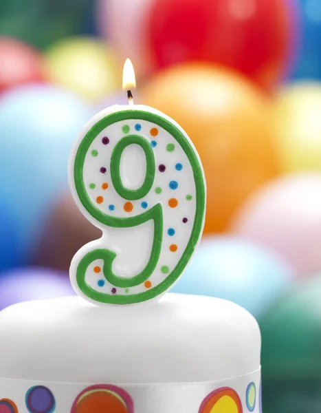 Candle number shape with balloons — Stock Photo, Image