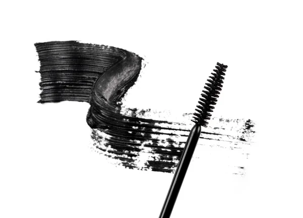 Beyaz bir arka plan üzerinde maskara