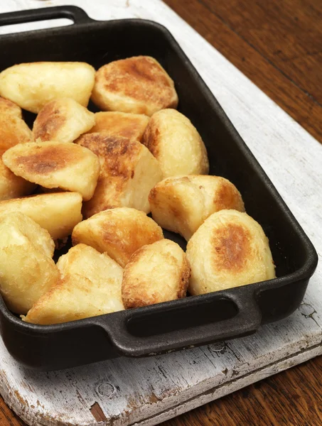 Pan filled with roast potatoes — Stock Photo, Image