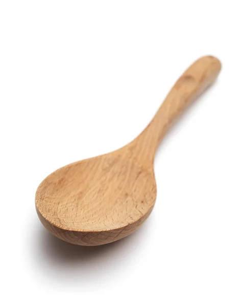 Cucchiaio di legno isolato su un bianco — Foto Stock