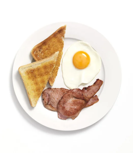 Fried breakfast on white plate — Stock Photo, Image