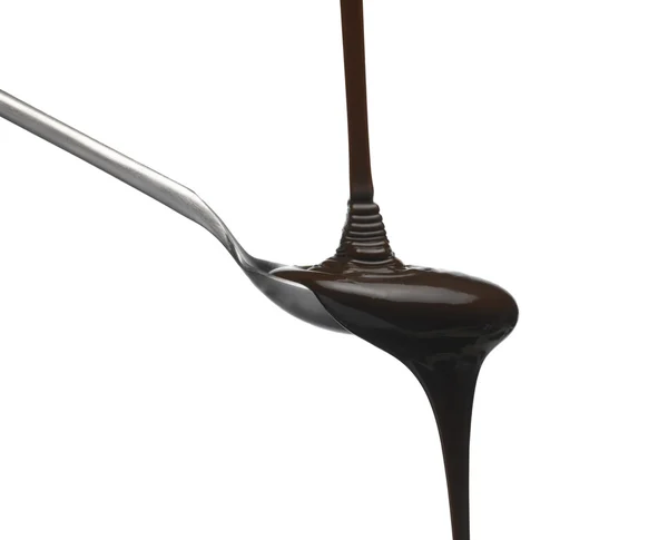 Chocolate cayendo en cuchara —  Fotos de Stock