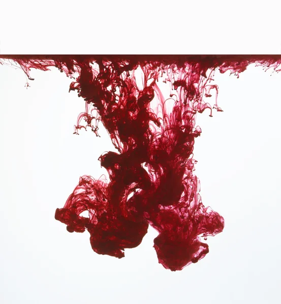 Vörös tinta a vízben — Stock Fotó
