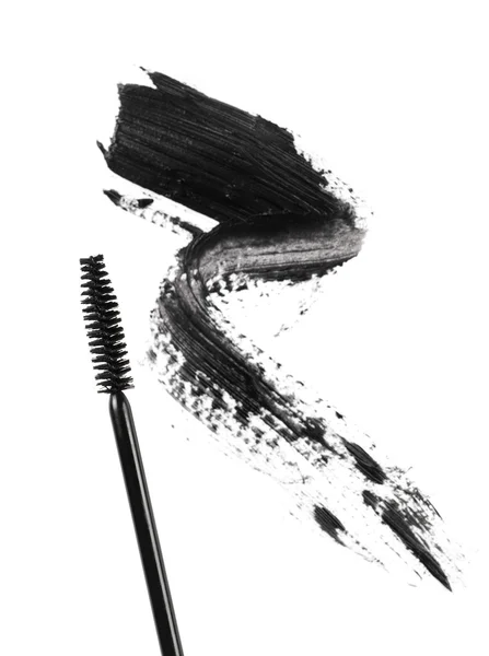 Beyaz bir arka plan üzerinde maskara