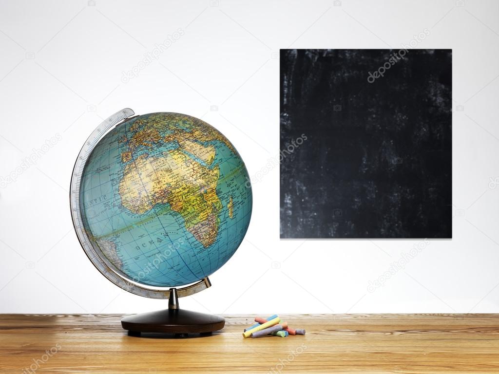 globe on a wooden table