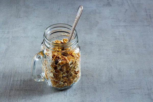 Jar with granola — Stock Photo, Image