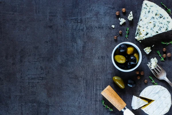 Cheese on stone background