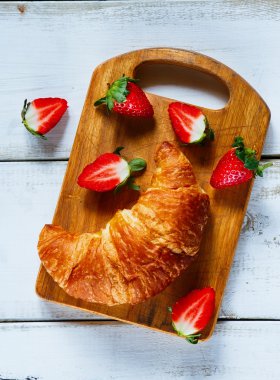 Croissants and ripe berries