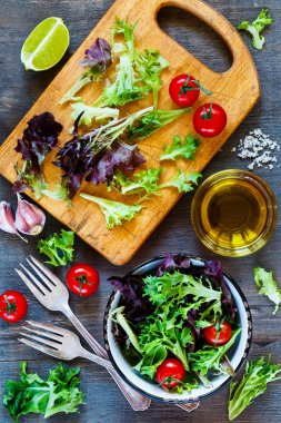 Healthy salad on cutting board