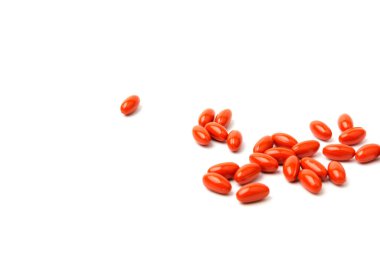 Beyaz arka planda Koenzim Q10. Yaşlanmayı önlemek için. İlaçlar ve ilaçlar.